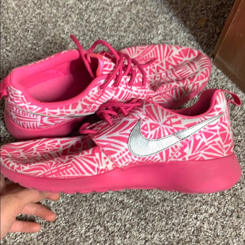 Pink Nike running shoes